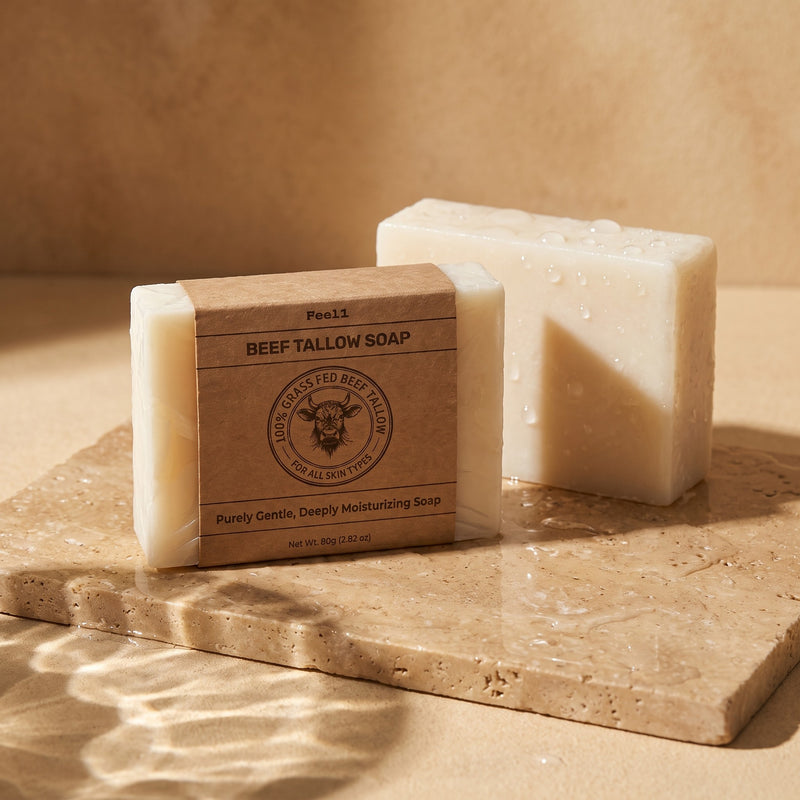 Feel1 Beef Tallow Soap twin pack with kraft sleeve on wet travertine stone